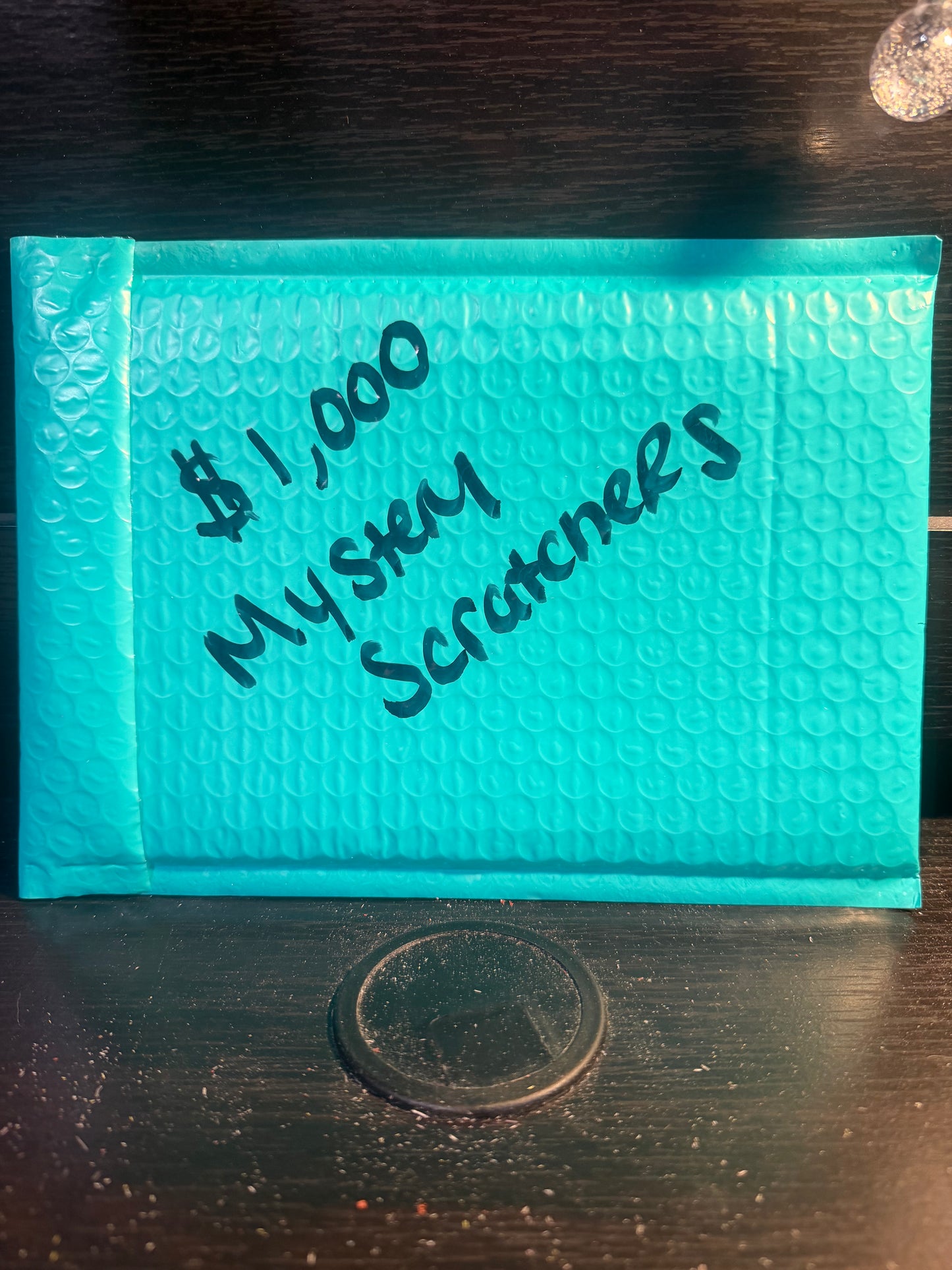 $1,000 Mystery Scratchers