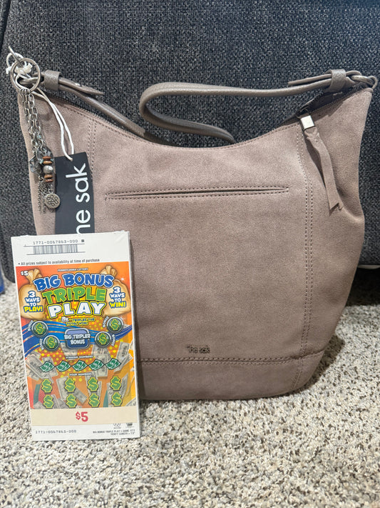 The Sak Hobo bag & Book of $5